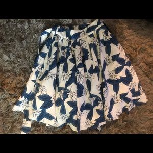 White flared skirt with blue flowers